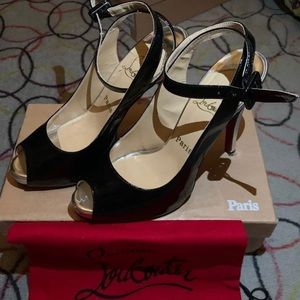Black and silver strappy loubs